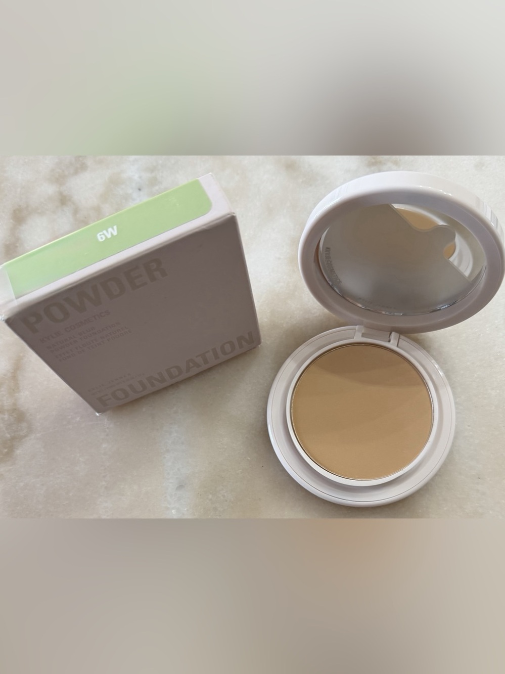 Kylie Cosmetics Natural Blur Powder Foundation in 6W medium with warm undertones